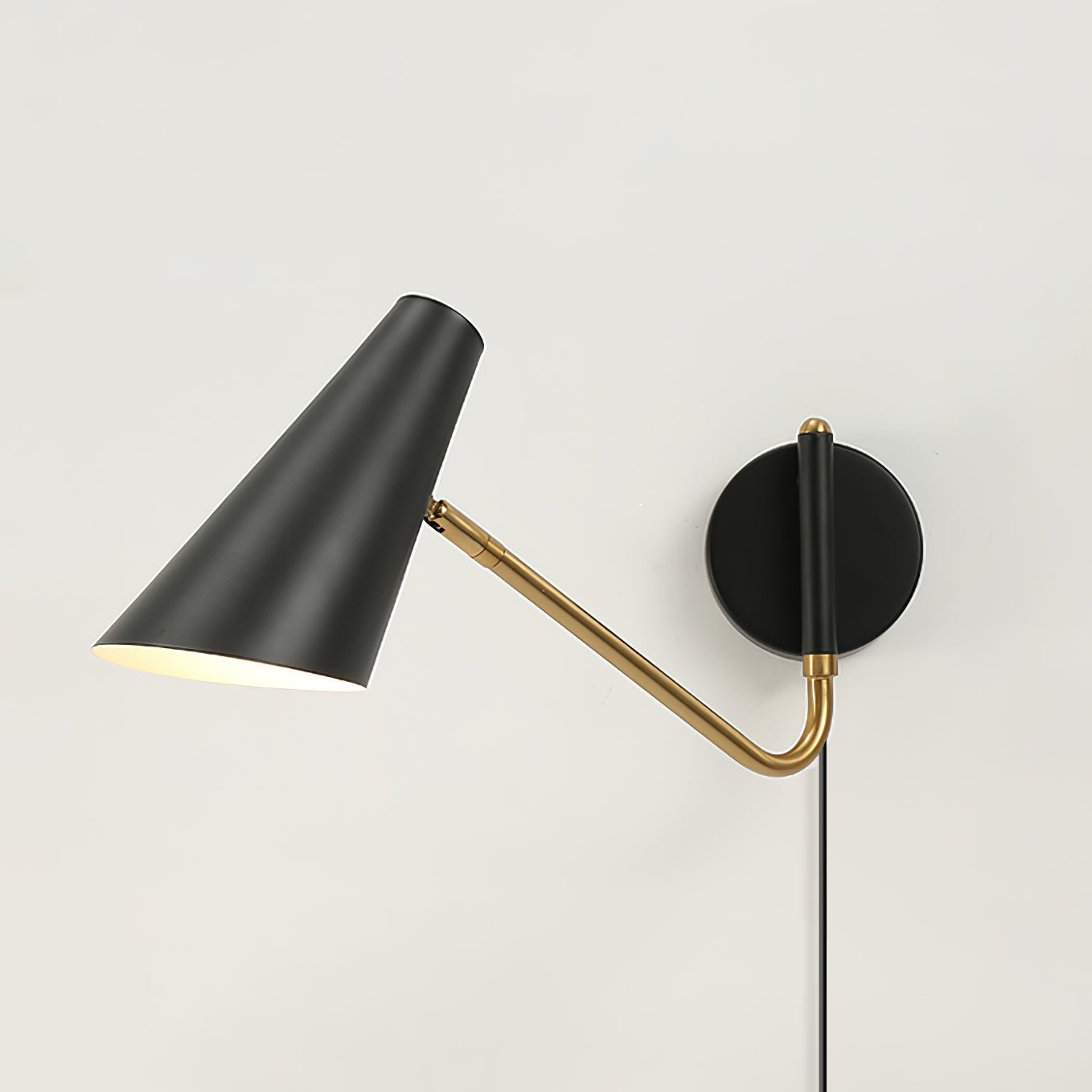 Apex Adjustable Swing Arm Wall Sconce Plug In Light with Conical Steel Shade in Black and Gold