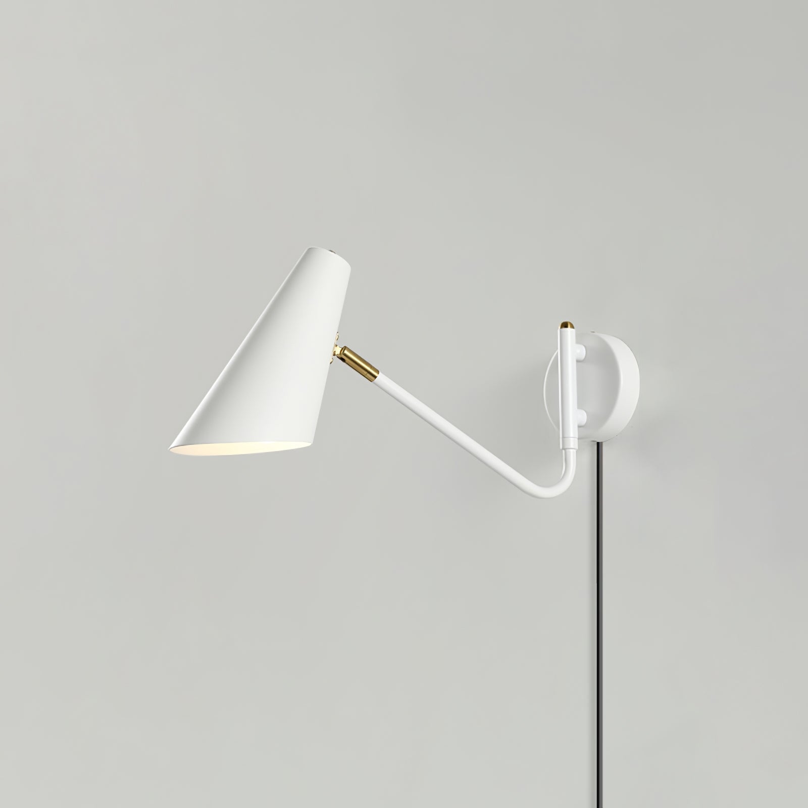 Apex Adjustable Swing Arm Wall Sconce Plug In Light with Conical Steel Shade in Black and Gold