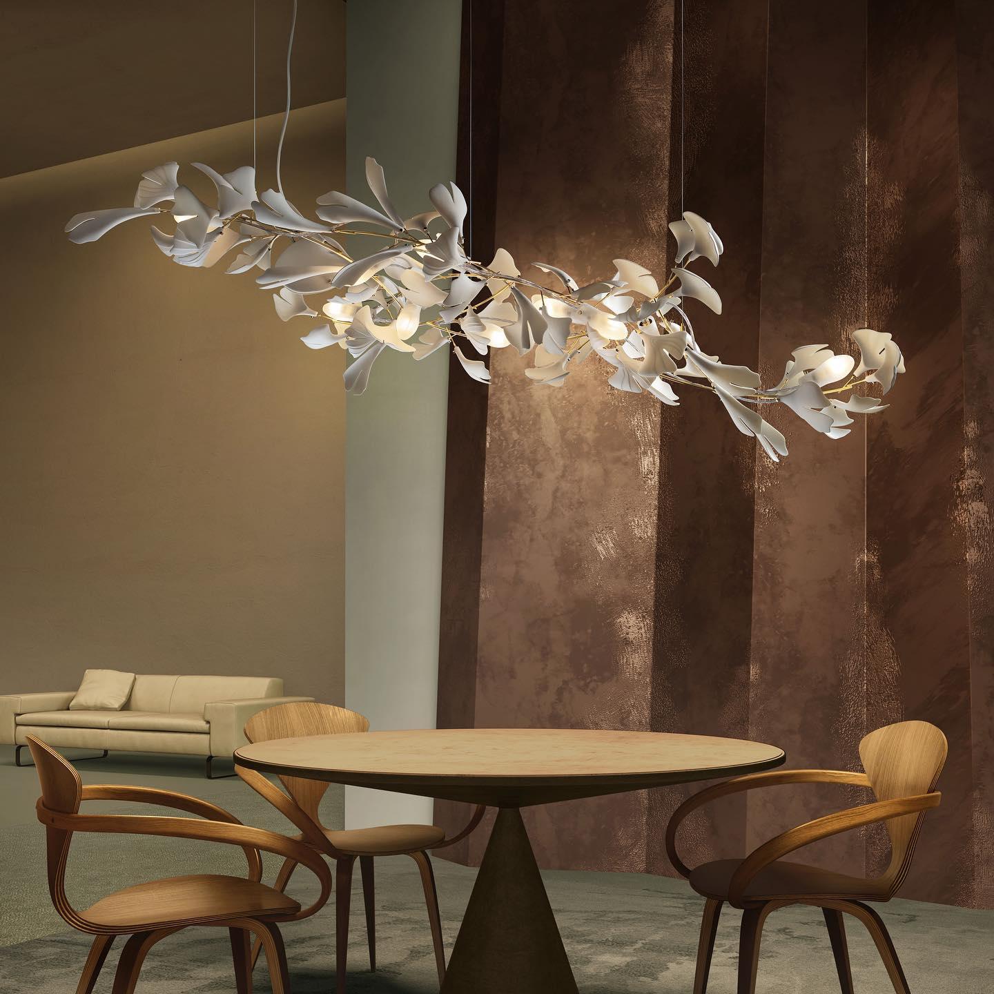 artistic-gingko-branch-chandelier-with-handcrafted-white-ceramic-leaves-and-gold-finish