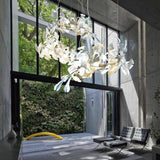 artistic-gingko-branch-chandelier-with-handcrafted-white-ceramic-leaves-and-gold-finish