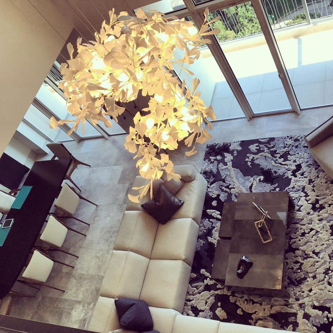 artistic-gingko-branch-chandelier-with-handcrafted-white-ceramic-leaves-and-gold-finish