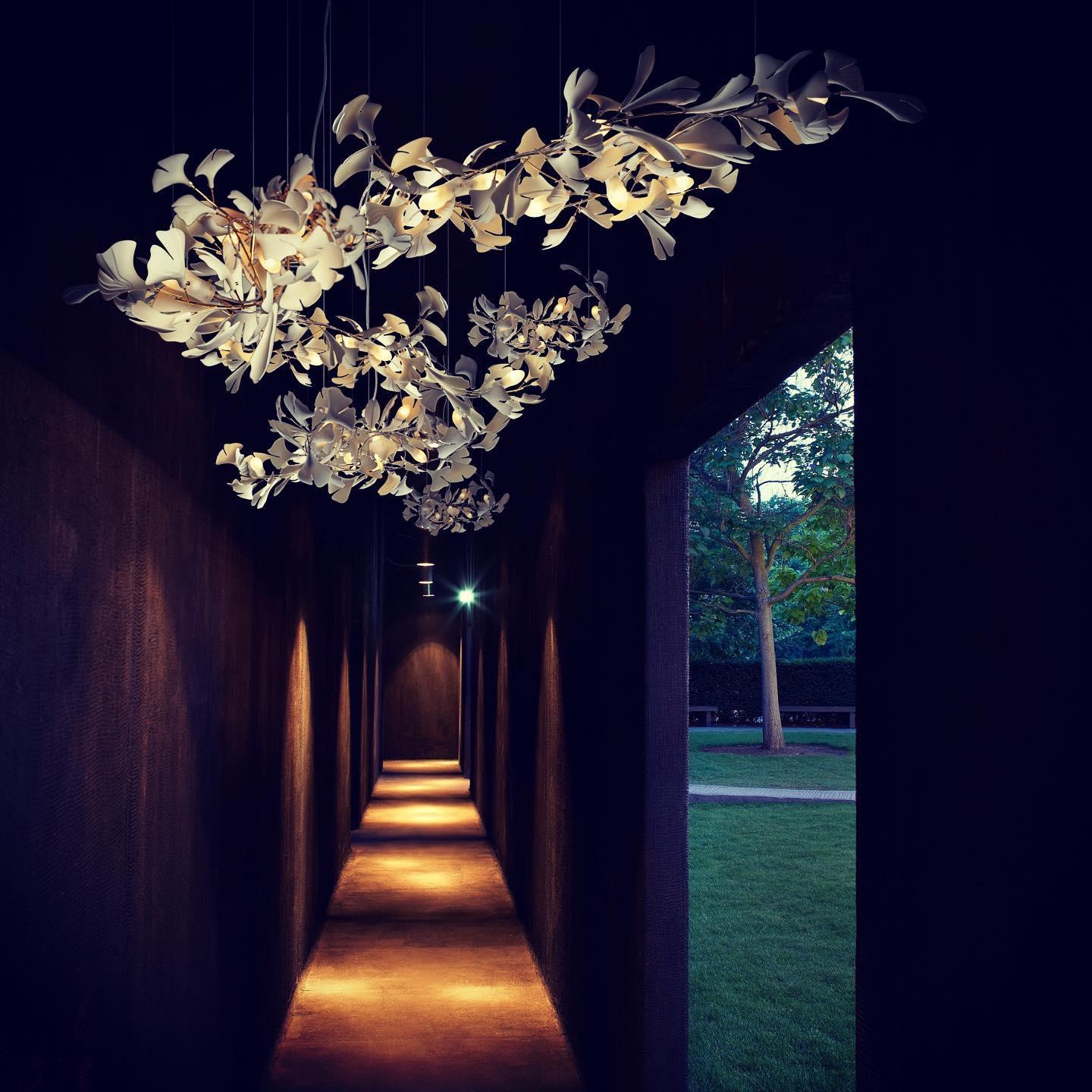 artistic-gingko-branch-chandelier-with-handcrafted-white-ceramic-leaves-and-gold-finish