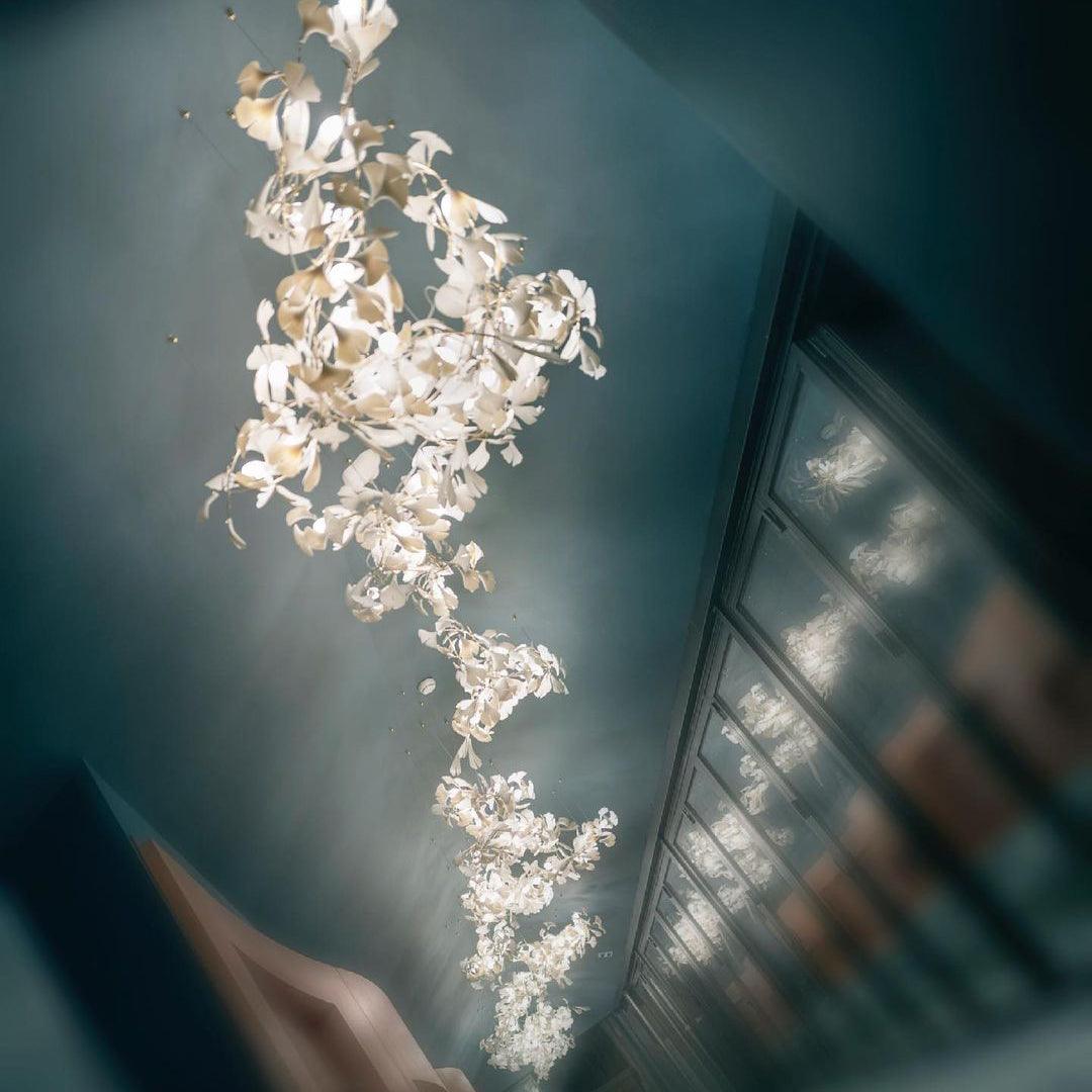 artistic-gingko-branch-chandelier-with-handcrafted-white-ceramic-leaves-and-gold-finish