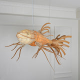 artistic-koi-fish-wood-slat-chandelier-large-scale-statement-lighting-for-home