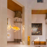 artistic-koi-fish-wood-slat-chandelier-large-scale-statement-lighting-for-home