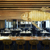 artistic-koi-fish-wood-slat-chandelier-large-scale-statement-lighting-for-home