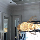 artistic-koi-fish-wood-slat-chandelier-large-scale-statement-lighting-for-home