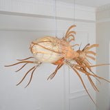 artistic-koi-fish-wood-slat-chandelier-large-scale-statement-lighting-for-home