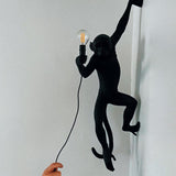 Artistic Monkey Resin Wall Sconce Whimsical Animal Design Interior Light