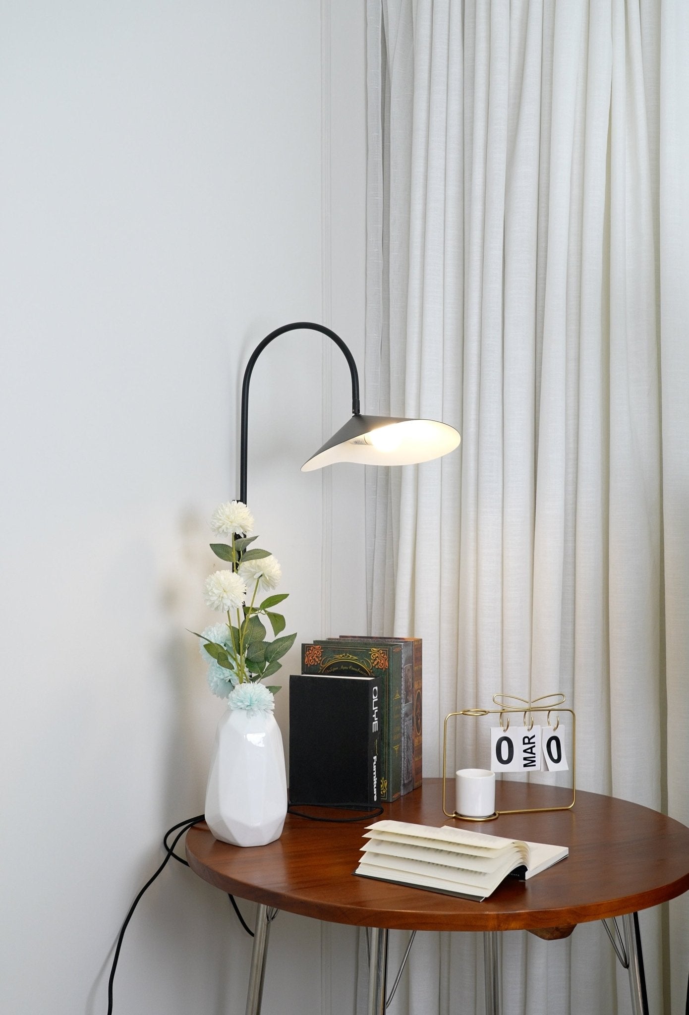 Arum Swivel Bracket Wall Lamp with Adjustable Curved Shade for Modern Interiors