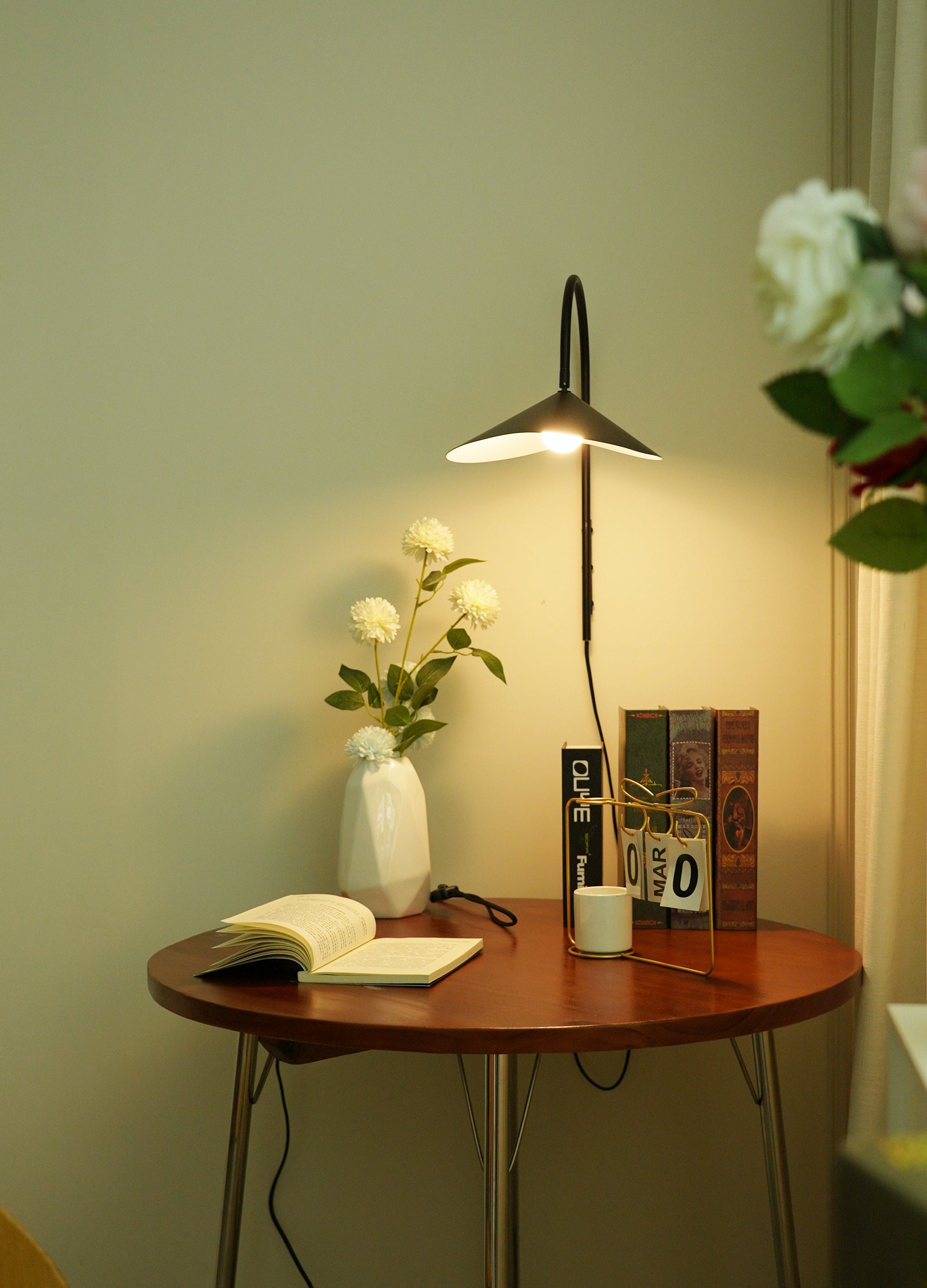 Arum Swivel Bracket Wall Lamp with Adjustable Curved Shade for Modern Interiors