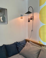 Arum Swivel Bracket Wall Lamp with Adjustable Curved Shade for Modern Interiors