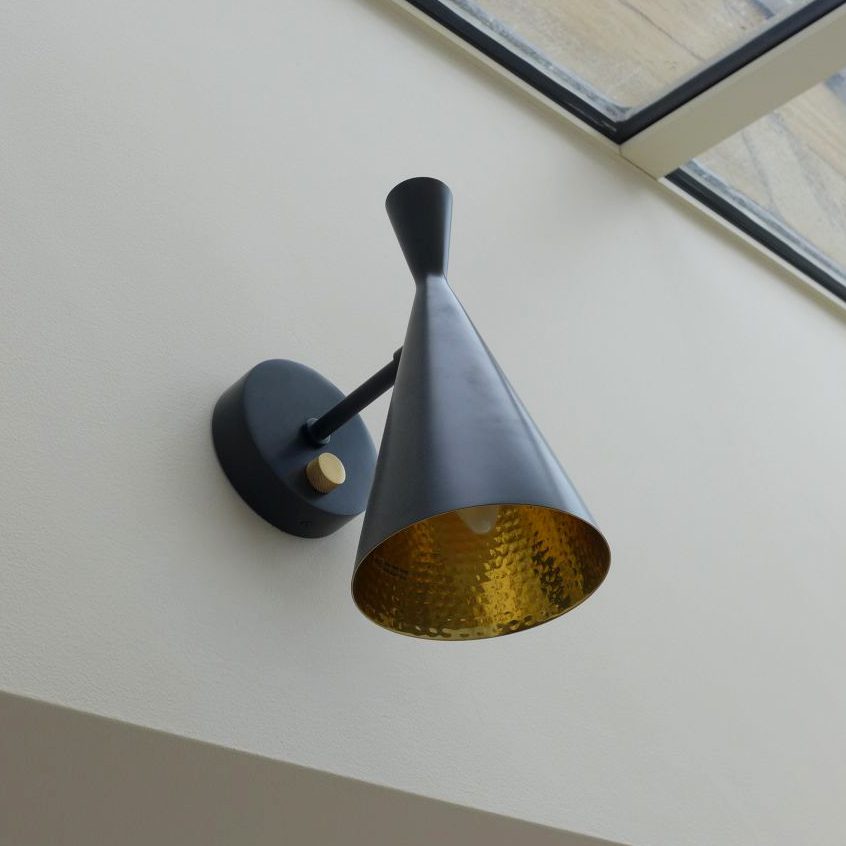 modern-beat-metal-wall-sconce-with-gold-interior-for-bedroom-and-living-room