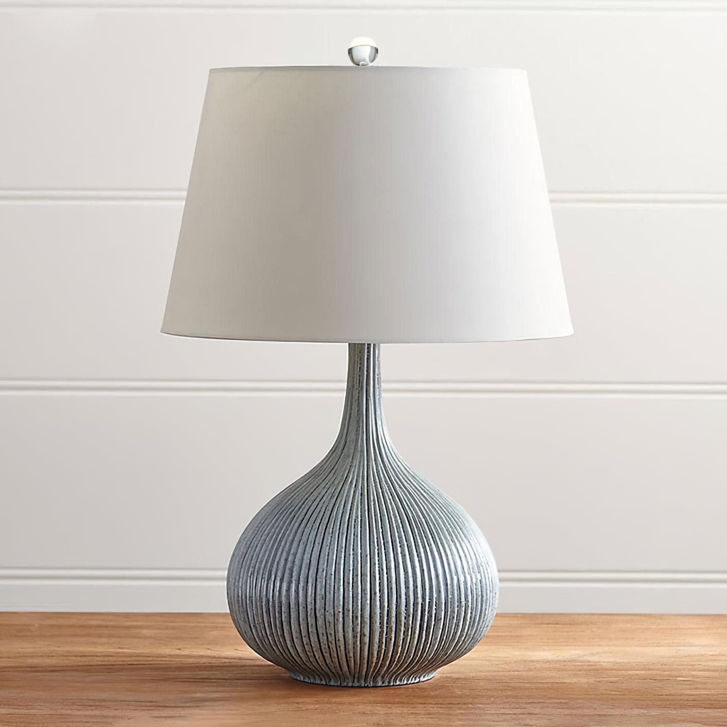 blue-sculptural-ceramic-table-lamp-with-white-fabric-shade-for-contemporary-living-room-decor