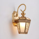 brass-and-glass-palace-pattern-exterior-wall-sconce-lighting-for-outdoor-patios-and-gardens