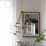 Calvert Gold Modern Ceiling Chandelier with Clear Textured Glass Shades