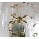 Calvert Gold Modern Ceiling Chandelier with Clear Textured Glass Shades