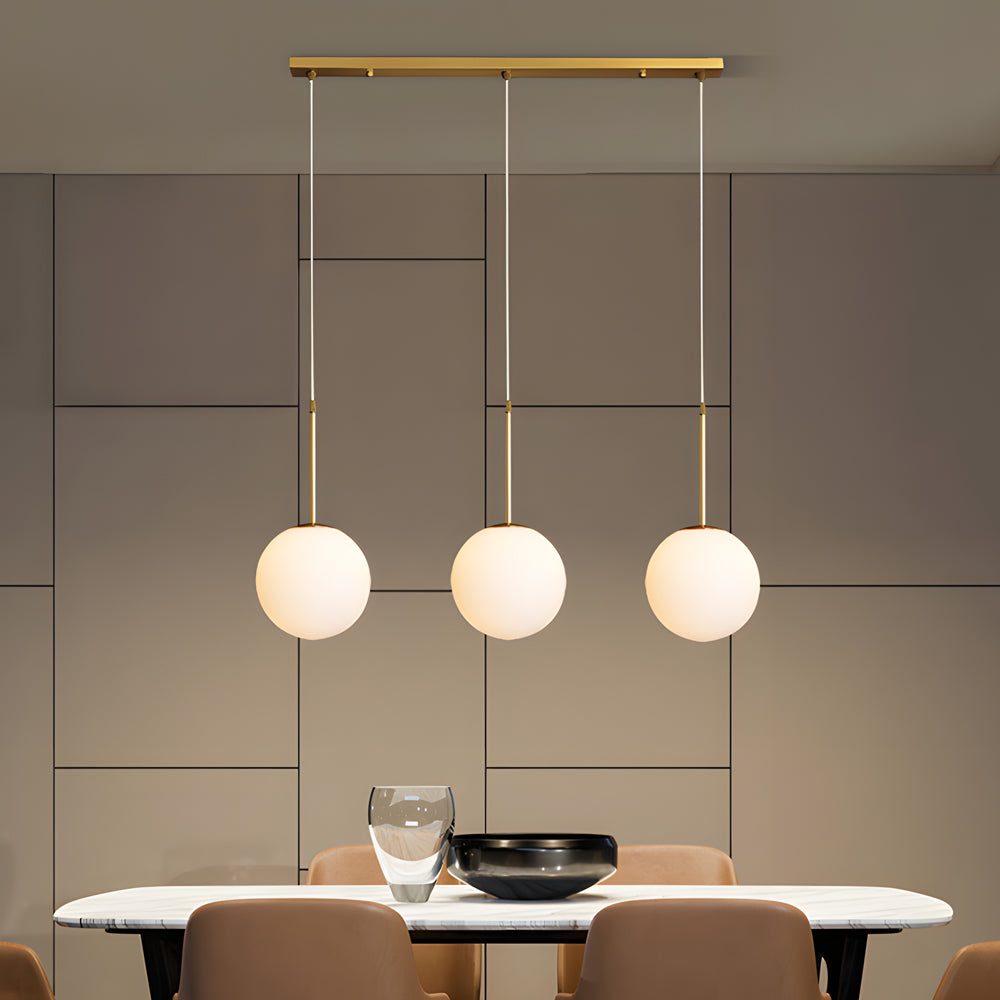 Contemporary Gold Globe Pendant Lighting with White Frosted Glass Shades for Kitchen