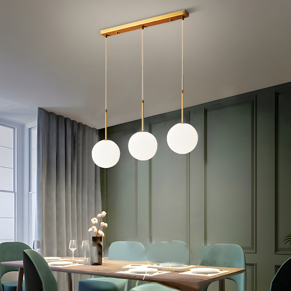 Contemporary Gold Globe Pendant Lighting with White Frosted Glass Shades for Kitchen