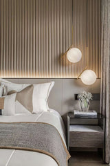 Contemporary Minimalist Equilibrium Glass Globe Pendant Light with Brass and Black Finishes