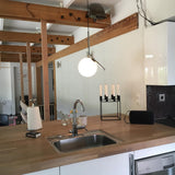 Contemporary Minimalist Equilibrium Glass Globe Pendant Light with Brass and Black Finishes