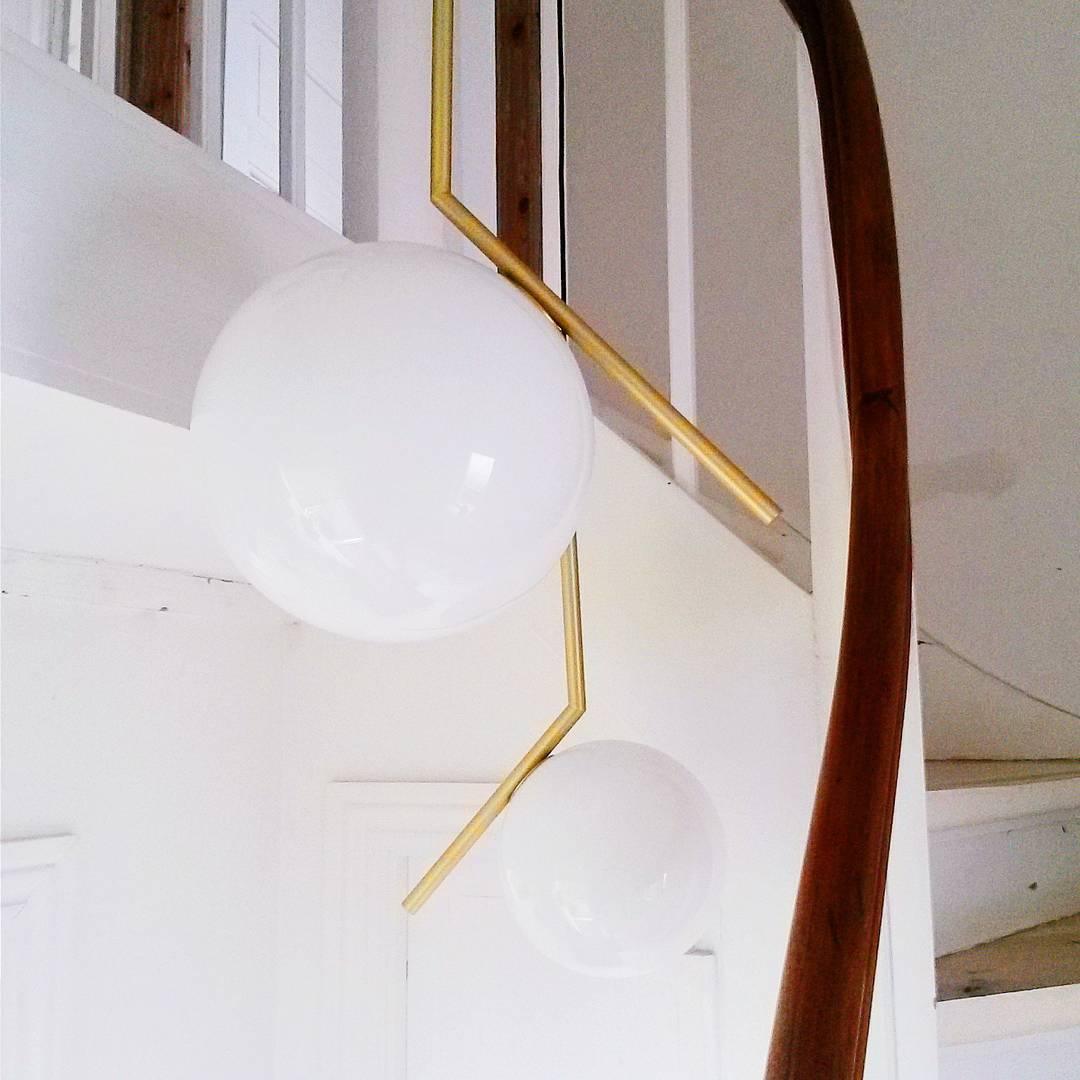 Contemporary Minimalist Equilibrium Glass Globe Pendant Light with Brass and Black Finishes