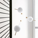 Contemporary Minimalist Equilibrium Glass Globe Pendant Light with Brass and Black Finishes