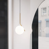 Contemporary Minimalist Equilibrium Glass Globe Pendant Light with Brass and Black Finishes