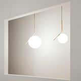 Contemporary Minimalist Equilibrium Glass Globe Pendant Light with Brass and Black Finishes