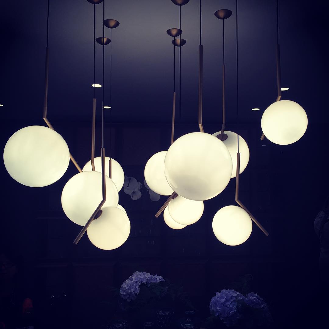 Contemporary Minimalist Equilibrium Glass Globe Pendant Light with Brass and Black Finishes