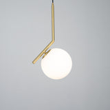 Contemporary Minimalist Equilibrium Glass Globe Pendant Light with Brass and Black Finishes