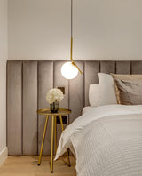 Contemporary Minimalist Equilibrium Glass Globe Pendant Light with Brass and Black Finishes