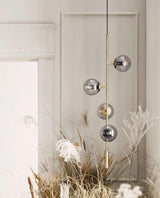 Contemporary Orb Glass Globe Vertical Pendant Light Brass and Glass Multi Light Fixture