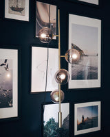 Contemporary Orb Glass Globe Vertical Pendant Light Brass and Glass Multi Light Fixture