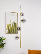 Contemporary Orb Glass Globe Vertical Pendant Light Brass and Glass Multi Light Fixture