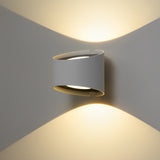 Creative Irregular Round LED Wall Sconce with Up and Down Lighting for Modern Living Spaces