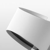 Creative Irregular Round LED Wall Sconce with Up and Down Lighting for Modern Living Spaces