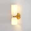 Edie Modern Geometric Wall Sconce with Opal Glass Shade and Brass Finish