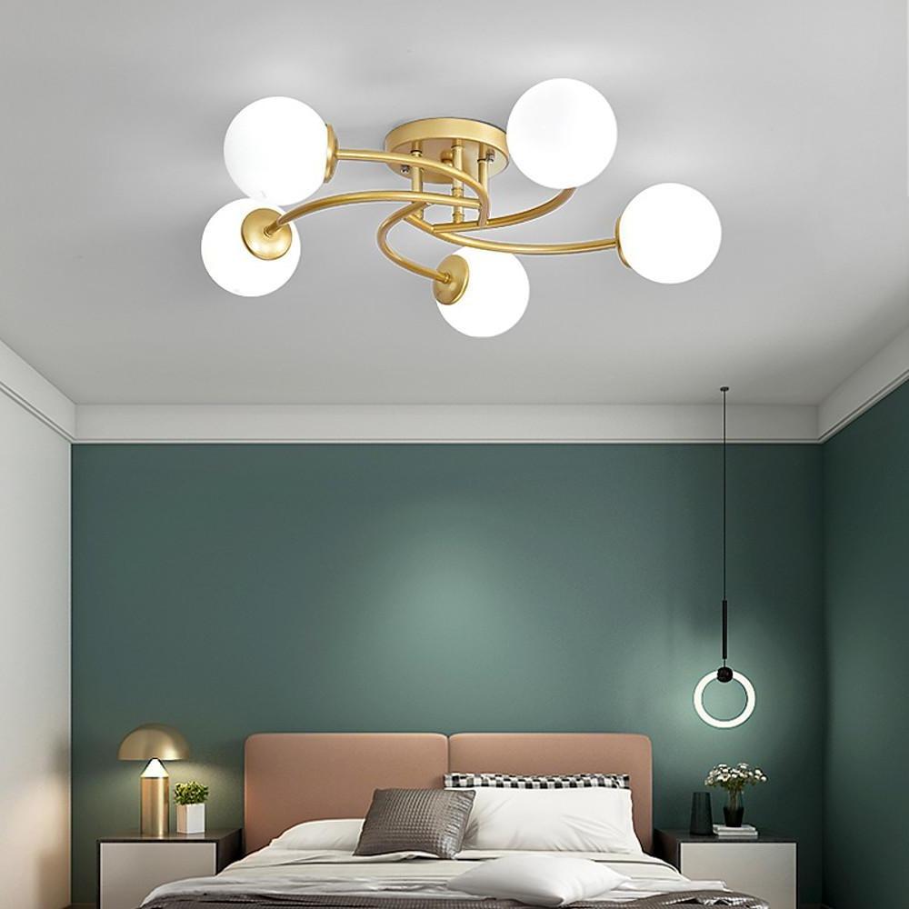 Modern Swirled Metal Flush Mount Light with Elegant Glass Globes for Ambient Bedroom Lighting