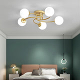 Modern Swirled Metal Flush Mount Light with Elegant Glass Globes for Ambient Bedroom Lighting