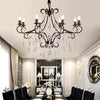 Elegant 8 Light Vintage Candle Chandelier with Crystal Accents and Metal Finish