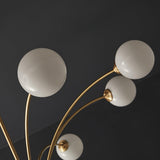 Elegant Brass Ceiling Light Fixture with Multiple Opaque White Glass Globes