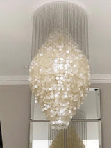 Elegant Coastal Shell Waterfall Chandelier with Cascading White Shell Discs for High Ceiling Spaces