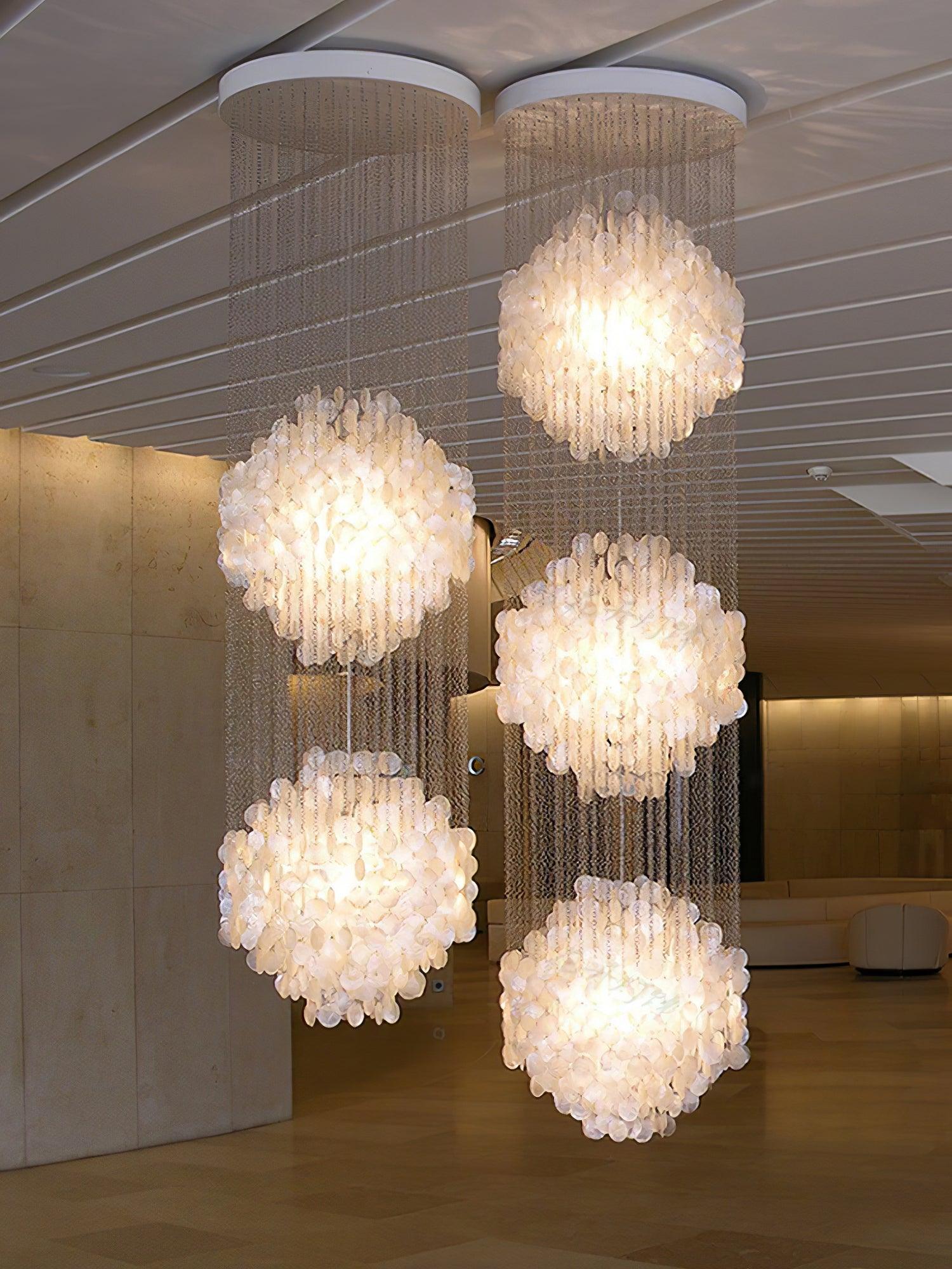 Elegant Coastal Shell Waterfall Chandelier with Cascading White Shell Discs for High Ceiling Spaces