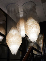 Elegant Coastal Shell Waterfall Chandelier with Cascading White Shell Discs for High Ceiling Spaces