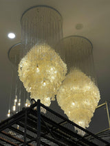 Elegant Coastal Shell Waterfall Chandelier with Cascading White Shell Discs for High Ceiling Spaces