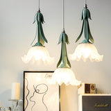 elegant-lily-of-the-valley-pendant-light-with-floral-glass-petals-for-modern-dining-rooms