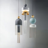 Elegant Metal Tassel Pendant Light with Integrated LED and Clear Glass Shade for Modern Interiors