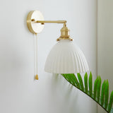 Elegant White Ceramic Pleated Wall Sconce with Brass Finish for Modern Home Decor