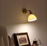 Elegant White Ceramic Pleated Wall Sconce with Brass Finish for Modern Home Decor